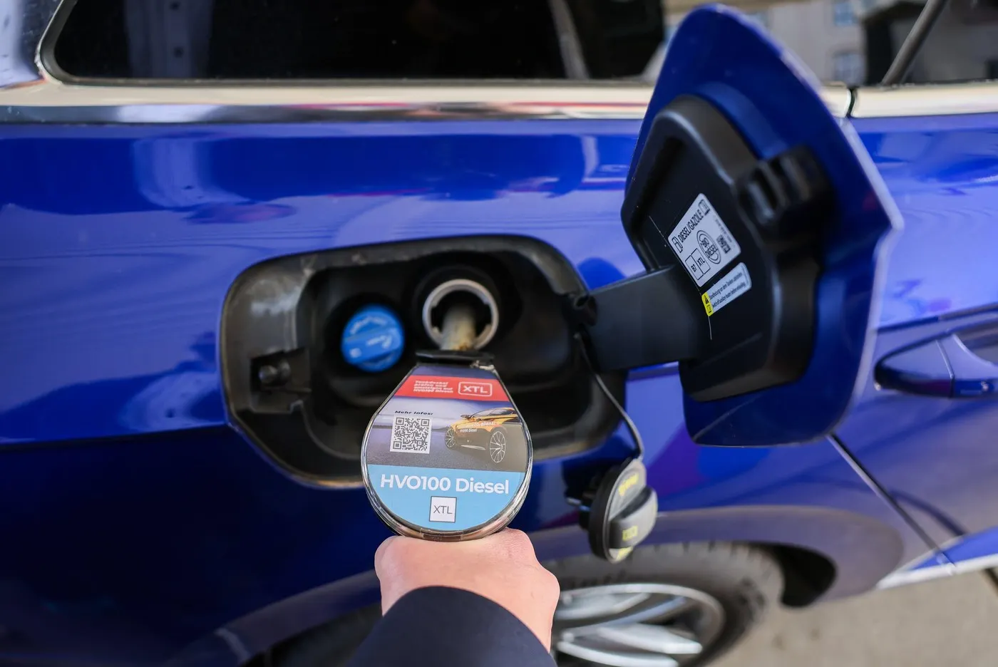 Hamburg, Germany. 15th Apr, 2024. A customer fills up with the new HVO100 Diesel fuel at a Nordoel filling station. A fuel pump for the new HVO100 diesel fuel was opened at the filling station on Monday. Credit: Christian Charisius/dpa/Alamy Live News
