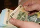 Leul mai pierde ceva teren în fața euro