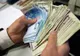 Dolarul sare de 4,1 lei, iar euro trece bine de 4,66 lei