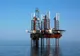 Prețul petrolului a scăzut din nou, pe fondul temerilor că revenirea economică mondială va întârzia