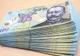 Sunt și PENSIONARI fericiți. Primesc lunar mai mulți bani decât MUGUR ISĂRESCU